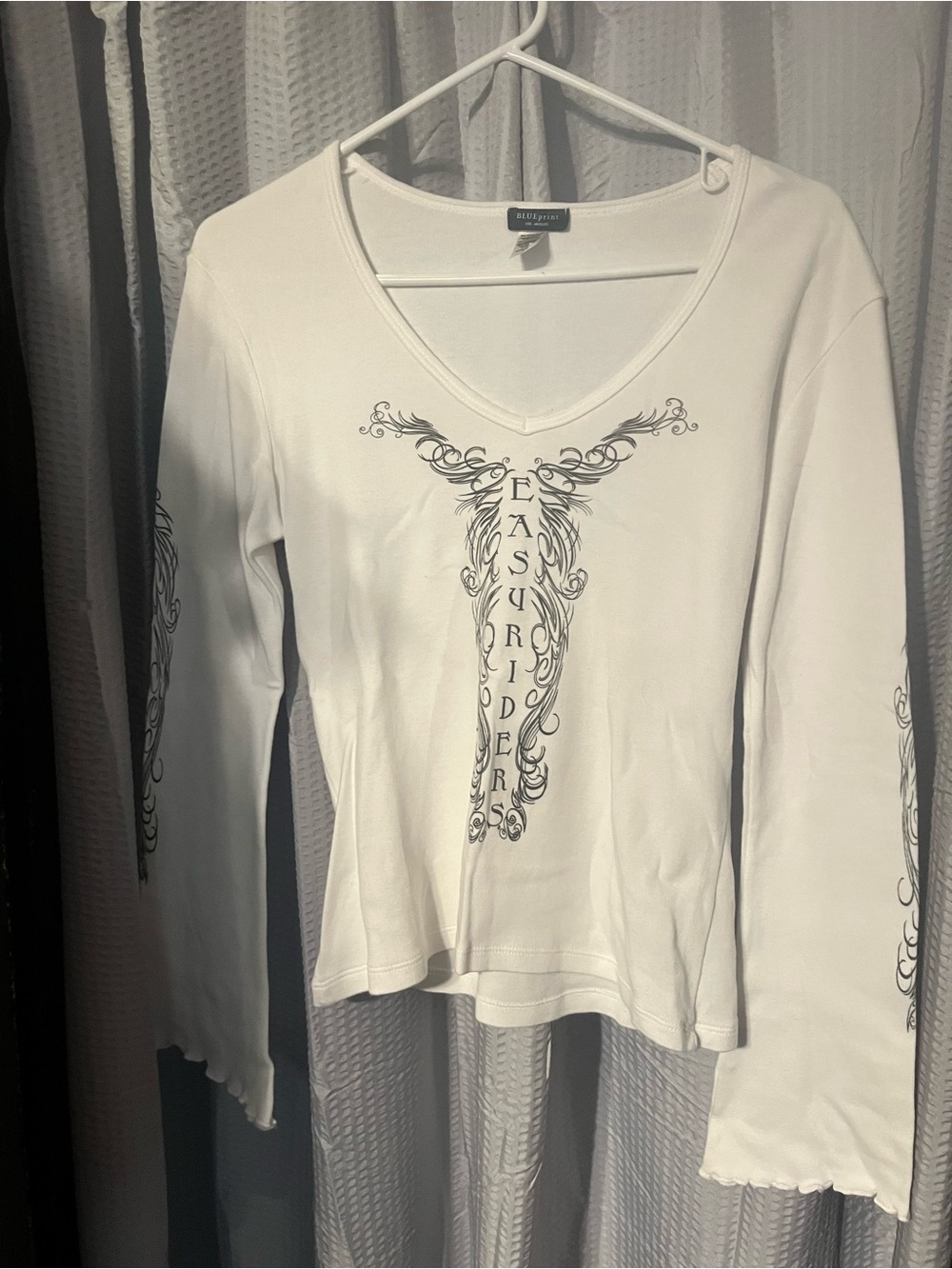 White V-Neck Long Sleeve Tee with Ornate Black Graphic